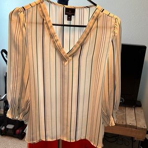 White blouse with green and black stripes